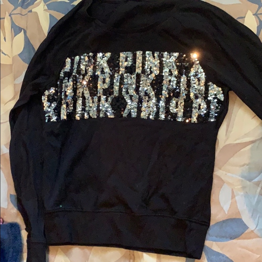 Black long sleeve top with PINK Logo on the front